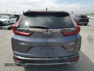2022 Honda CR-V Touring z VIN 7FARW2H96NE052072, wystawiony jako Copart lot #52214465 z przebiegiem 63 832 mil mil oraz Szkoda całkowita • Salvage title. Historia ofert i sprzedaży dostępna na DreamBid. Obrazek 6.