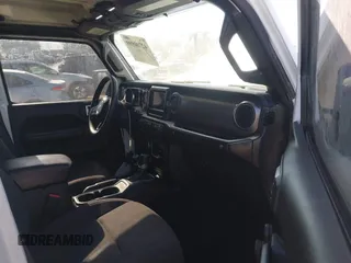 2023 Jeep Wrangler Willys with VIN 1C4HJXDG0PW638871, listed as a IAAI auction lot 42700599 with 16,171 mi miles and . Bid and sale history available at DreamBid. Image 5.