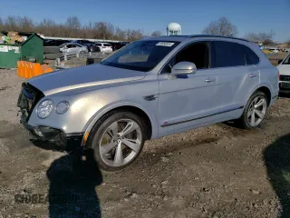 2017 Bentley Bentayga W12 z VIN SJAAC2ZV7HC012616, wystawiony jako Copart lot #84858834 z przebiegiem 40 750 mil mil oraz Szkody całkowita. Historia ofert i sprzedaży dostępna na DreamBid. Obrazek 1.