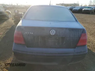 2000 Volkswagen Jetta GLS z VIN 3VWSA29M7YM057356, wystawiony jako Copart lot #76960844 z przebiegiem 299 410 mil mil oraz Szkoda całkowita • Salvage title. Historia ofert i sprzedaży dostępna na DreamBid. Obrazek 6.