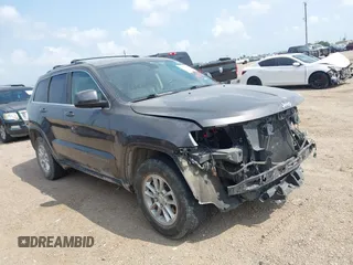 2020 Jeep Grand Cherokee Laredo E with VIN 1C4RJEAG2LC284912, listed as a IAAI auction lot 42114881 with 86,579 mi miles and . Bid and sale history available at DreamBid. Image 14.