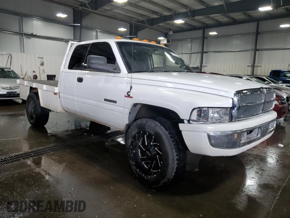 1999 Dodge Ram 2500 with VIN 1B7KF23W3XJ633020, listed as a Copart auction lot 79125714 with 223,927 mi miles and Salvage Title. Bid and sale history available at carsss.com. Image 4.