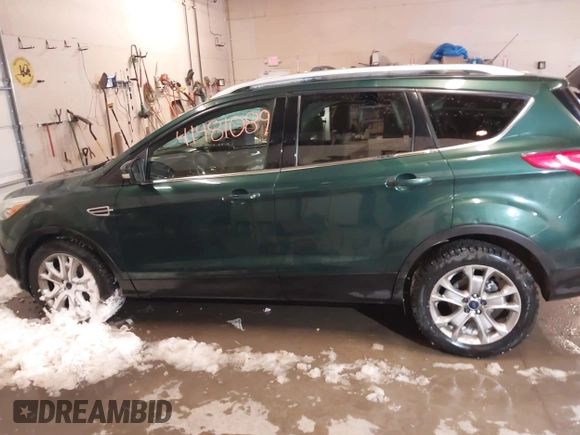 2014 Ford Escape Titanium with VIN 1FMCU9J93EUB95638, listed as a IAAI auction lot 41481089 with 182,258 mi miles. Bid and sale history available at carsss.com. Image 15.