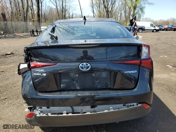2021 Toyota Prius L Eco with VIN JTDKAMFU6M3150108, listed as a Copart auction lot 53690385 with 105,765 mi miles and Salvage Title. Bid and sale history available at carsss.com. Image 6.