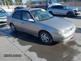 1999 Toyota Corolla VE z VIN 1NXBR18E6XZ225512, wystawiony jako IAAI lot #41842023 z przebiegiem 324 718 mil mil oraz . Historia ofert i sprzedaży dostępna na DreamBid. Obrazek 1.