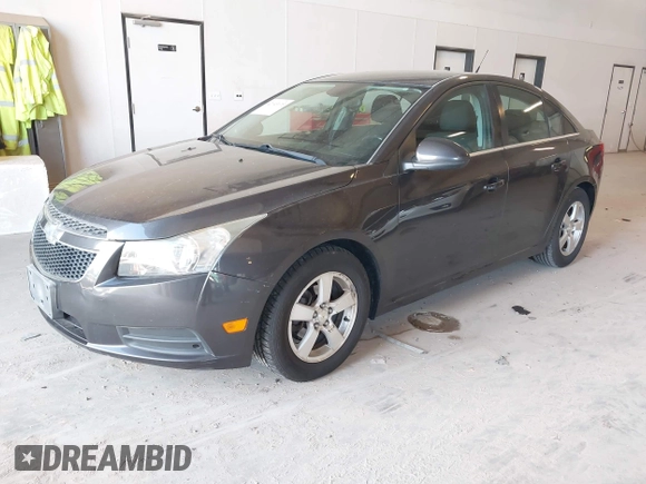 2014 Chevrolet Cruze 1LT with VIN 1G1PC5SB1E7258259, listed as a IAAI auction lot 42143073 with 101,687 mi miles and . Bid and sale history available at DreamBid. Image 2.