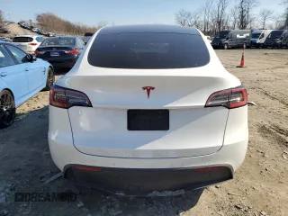 2020 Tesla Model Y Long Range with VIN 5YJYGDEE2LF041925, listed as a Copart auction lot 47092675 with 75,871 mi miles and Salvage Title. Bid and sale history available at DreamBid. Image 6.