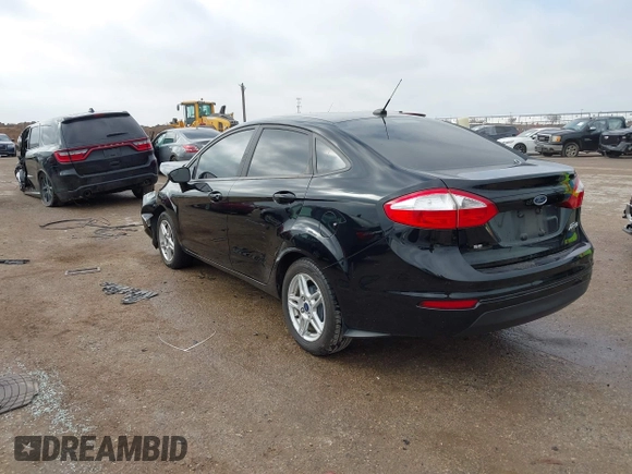 2019 Ford Fiesta SE z VIN 3FADP4BJ7KM158142, wystawiony jako IAAI lot #41510806 z przebiegiem 55 315 mil mil oraz . Historia ofert i sprzedaży dostępna na DreamBid. Obrazek 3.
