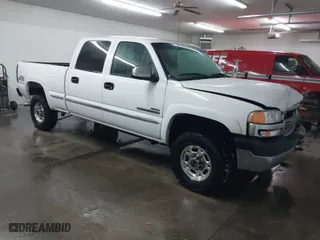 2002 GMC Sierra 2500HD SLE with VIN 1GTHK23162F201057, listed as a IAAI auction lot 41409529 with 104,267 mi miles. Bid and sale history available at carsss.com. Image 1.