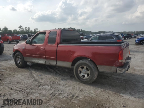 2001 Ford F-150 XL with VIN 1FTRX17W71NB71934, listed as a Copart auction lot 54231605 with 257,867 mi miles and Salvage title. Bid and sale history available at DreamBid. Image 2.