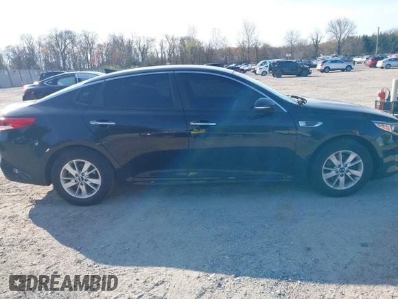 2016 Kia Optima LX with VIN 5XXGT4L36GG105637, listed as a IAAI auction lot 42013800 with 111,836 mi miles. Bid and sale history available at carsss.com. Image 12.