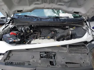 2021 Ford F-150 XL with VIN 1FTMF1E5XMKE21132, listed as a IAAI auction lot 42445898 with 114,014 mi miles and . Bid and sale history available at DreamBid. Image 10.