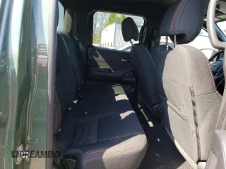 2023 Nissan Frontier Pro-4X z VIN 1N6ED1EK1PN660195, wystawiony jako Copart lot #54216795 z przebiegiem 18 556 mil mil oraz Szkoda całkowita • Salvage title. Historia ofert i sprzedaży dostępna na DreamBid. Obrazek 10.