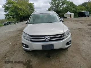 2013 Volkswagen Tiguan SE z VIN WVGBV7AX0DW539618, wystawiony jako Copart lot #71529804 z przebiegiem 148 362 mil mil oraz Szkoda całkowita • Salvage title. Historia ofert i sprzedaży dostępna na DreamBid. Obrazek 10.
