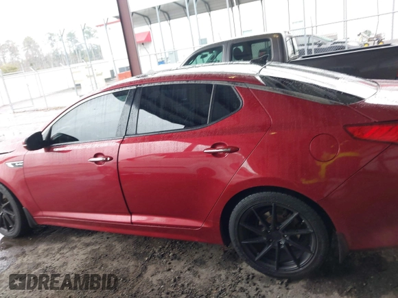 2014 Kia Optima SX Turbo with VIN 5XXGR4A60EG286453, listed as a IAAI auction lot 41661379 with 163,206 mi miles and . Bid and sale history available at DreamBid. Image 14.