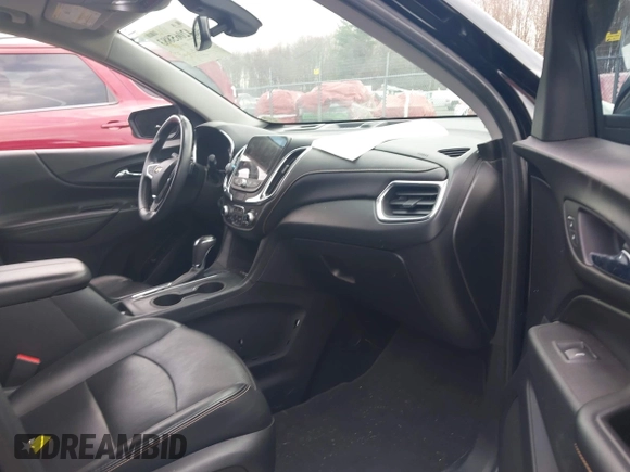 2018 Chevrolet Equinox Premier with VIN 2GNAXWEX6J6302935, listed as a IAAI auction lot 42065883 with 61,983 mi miles and . Bid and sale history available at carsss.com. Image 5.