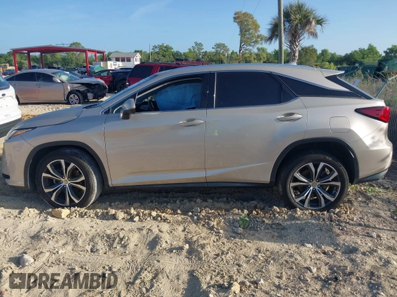 2016 Lexus RX 350 with VIN 2T2ZZMCA7GC007449, listed as a IAAI auction lot 41926313 with 74,619 mi miles and . Bid and sale history available at DreamBid. Image 14.