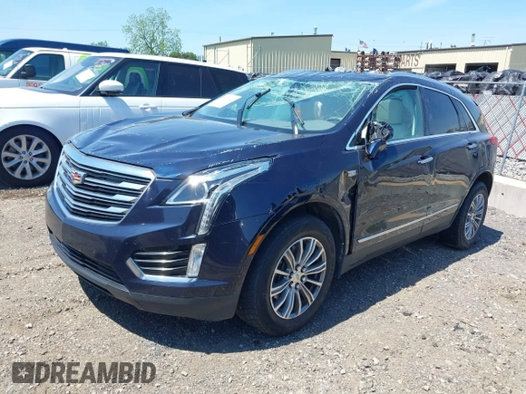 2017 Cadillac XT5 Luxury FWD with VIN 1GYKNBRS2HZ134259, listed as a IAAI auction lot 39416446 with 87,917 mi miles. Bid and sale history available at carsss.com. Image 2.