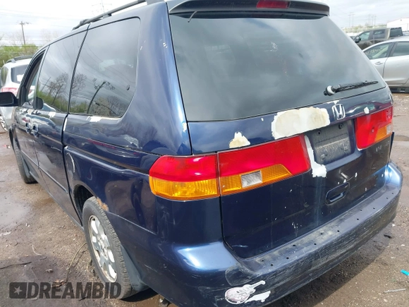2004 Honda Odyssey EX-L with VIN 5FNRL189X4B045588, listed as a IAAI auction lot 41928397 with 218,182 mi miles and . Bid and sale history available at DreamBid. Image 3.