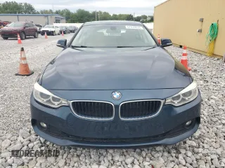 2015 BMW 4 Series 428i xDrive with VIN WBA4C9C57FD330687, listed as a Copart auction lot 67639034 with 114,779 mi miles and Salvage title. Bid and sale history available at DreamBid. Image 5.