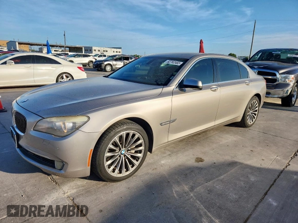 2012 BMW 7 Series 740Li with VIN WBAKB4C59CC576610, listed as a Copart auction lot 62762465 with 128,073 mi miles and Clean title. Bid and sale history available at DreamBid. Image 1.