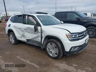 2019 Volkswagen Atlas SEL z VIN 1V2ER2CA1KC620397, wystawiony jako IAAI lot #41009656 z przebiegiem 75 143 mil mil oraz . Historia ofert i sprzedaży dostępna na DreamBid. Obrazek 1.