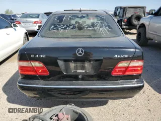 2001 Mercedes-Benz E-Class AWD with VIN WDBJF83J31X058259, listed as a Copart auction lot 74370604 with 131,454 mi miles and Clean Title. Bid and sale history available at carsss.com. Image 6.