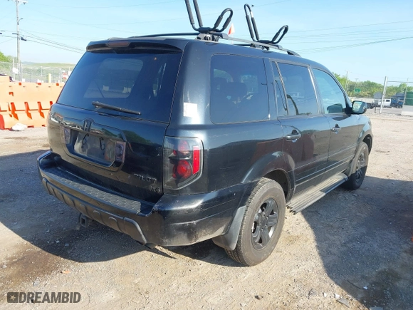 2004 Honda Pilot EX with VIN 2HKYF18614H535377, listed as a IAAI auction lot 42099729 with 362,460 mi miles. Bid and sale history available at carsss.com. Image 4.
