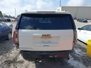 2016 GMC Yukon XL SLE with VIN 1GKS1FKC0GR331459, listed as a IAAI auction lot 41557718 with 203,803 mi miles. Bid and sale history available at carsss.com. Image 16.