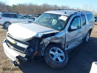 2014 Chevrolet Suburban LT with VIN 1GNSKJE71ER165211, listed as a IAAI auction lot 41668291 with 138,608 mi miles. Bid and sale history available at carsss.com. Image 21.