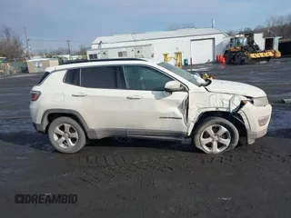2019 Jeep Compass Latitude with VIN 3C4NJDBB7KT703593, listed as a IAAI auction lot 41490224 with 99,640 mi miles. Bid and sale history available at carsss.com. Image 13.