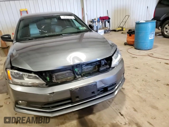 2015 Volkswagen Jetta SE with VIN 3VWD17AJ2FM421669, listed as a Copart auction lot 45633745 with 147,467 mi miles and Salvage title. Bid and sale history available at DreamBid. Image 14.