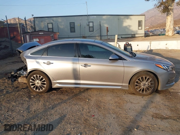 2015 Hyundai Sonata 2.4L Sport with VIN 5NPE34AF4FH019959, listed as a IAAI auction lot 41020000 with 129,535 mi miles. Bid and sale history available at carsss.com. Image 13.