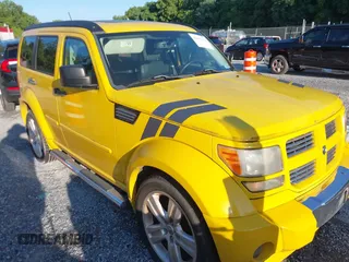 2010 Dodge Nitro Shock with VIN 1D4PU7GX7AW174602, listed as a IAAI auction lot 42840354 with 159,101 mi miles and . Bid and sale history available at DreamBid. Image 1.