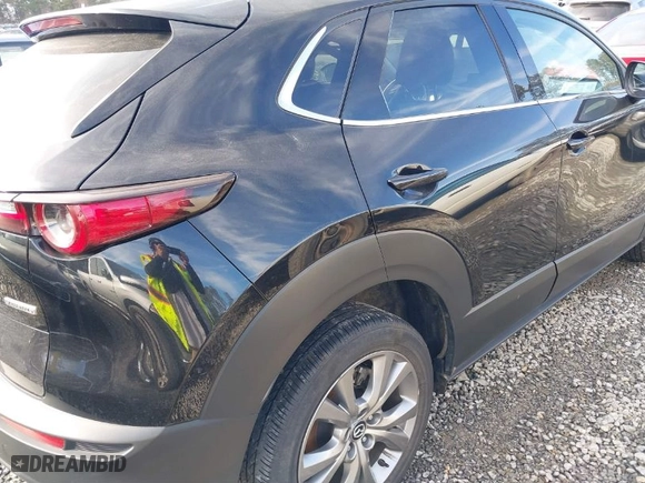 2023 Mazda CX-30 2.5 S Premium Package with VIN 3MVDMBDM7PM528297, listed as a IAAI auction lot 41637542 with 48,935 mi miles. Bid and sale history available at carsss.com. Image 6.