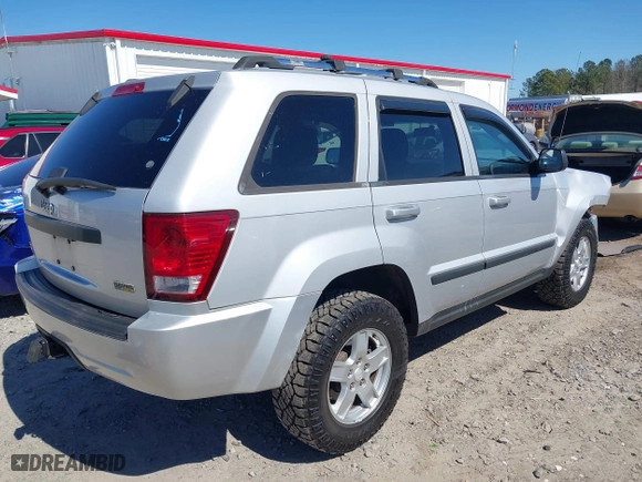2007 Jeep Grand Cherokee Laredo with VIN 1J8HR48P87C687411, listed as a IAAI auction lot 41774029 with 212,763 mi miles. Bid and sale history available at carsss.com. Image 4.