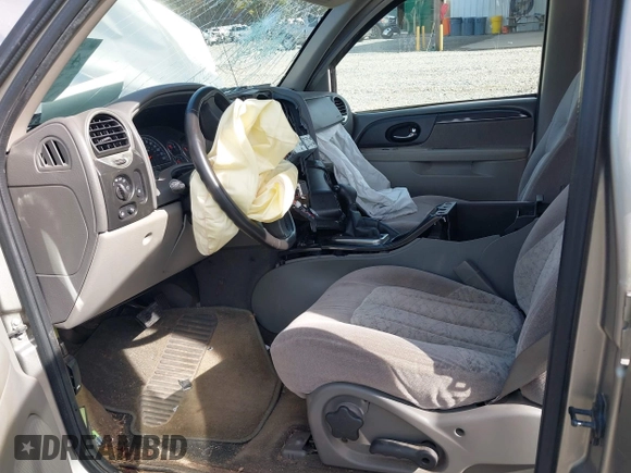 2003 GMC Envoy SLT with VIN 1GKDS13SX32203909, listed as a IAAI auction lot 41457713 with 199,507 mi miles. Bid and sale history available at carsss.com. Image 5.