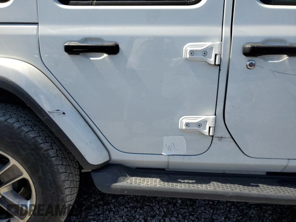 2019 Jeep Wrangler Unlimited Sahara with VIN 1C4HJXEG8KW574005, listed as a Copart auction lot 55386585 with Not provided miles and Salvage title. Bid and sale history available at DreamBid. Image 12.