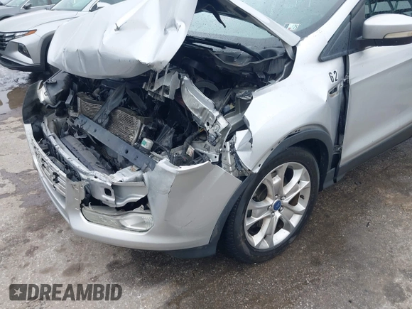2013 Ford Escape SEL z VIN 1FMCU9H97DUA34665, wystawiony jako IAAI lot #42258567 z przebiegiem 174 227 mil mil oraz . Historia ofert i sprzedaży dostępna na DreamBid. Obrazek 17.