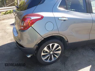 2019 Buick Encore Essence with VIN KL4CJGSM5KB869925, listed as a IAAI auction lot 41937487 with 105,702 mi miles. Bid and sale history available at carsss.com. Image 19.