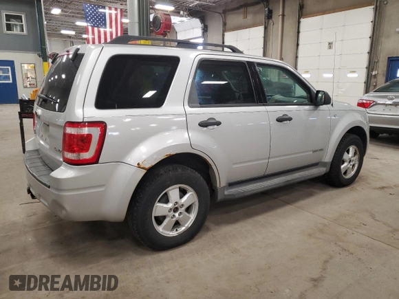 2008 Ford Escape XLT с VIN 1FMCU93128KD51496, выставлен на аукционе Copart как лот 57055865 с пробегом 204 224 миль миль и Списание • Salvage title. История ставок и продаж доступна на DreamBid. Изображение 3.