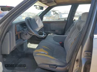 1991 Dodge Dynasty LE z VIN 1B3XC56R9MD115785, wystawiony jako Copart lot #48073715 z przebiegiem 64 483 mil mil oraz Szkoda całkowita • Salvage title. Historia ofert i sprzedaży dostępna na DreamBid. Obrazek 7.