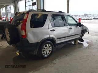 2006 Honda CR-V EX with VIN JHLRD78856C033763, listed as a IAAI auction lot 41715433 with 220,490 mi miles and . Bid and sale history available at carsss.com. Image 4.