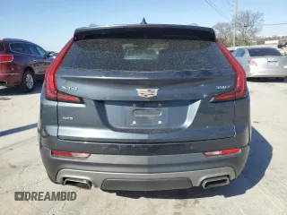 2021 Cadillac XT4 AWD Premium Luxury with VIN 1GYFZDR47MF002175, listed as a Copart auction lot 48303665 with 94,698 mi miles and Salvage Title. Bid and sale history available at carsss.com. Image 6.