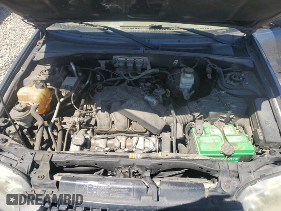 2005 Ford Escape XLT with VIN 1FMCU93105KA43061, listed as a Copart auction lot 62324555 with 121,517 mi miles and Salvage title. Bid and sale history available at DreamBid. Image 11.