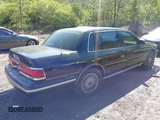 1992 Lincoln Continental with VIN 1LNLM9749NY670102, listed as a IAAI auction lot 41968015 with Not Provided miles and . Bid and sale history available at DreamBid. Image 4.