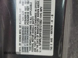 2014 Honda Odyssey Touring z VIN 5FNRL5H91EB121062, wystawiony jako Copart lot #53546515 z przebiegiem 192 136 mil mil oraz Szkoda całkowita • Salvage title. Historia ofert i sprzedaży dostępna na DreamBid. Obrazek 14.