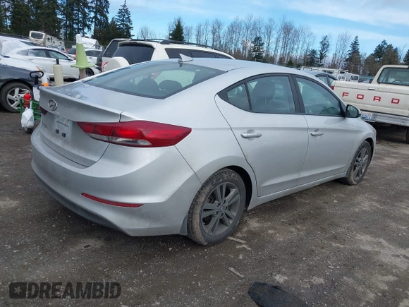 2018 Hyundai Elantra SEL with VIN 5NPD84LF8JH239866, listed as a IAAI auction lot 41597467 with 164,151 mi miles and . Bid and sale history available at DreamBid. Image 4.