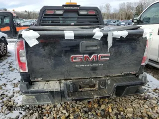 2022 GMC Canyon 4WD AT4 w/Leather with VIN 1GTG6FENXN1294450, listed as a Copart auction lot 80999634 with 0 mi miles and Salvage Title. Bid and sale history available at carsss.com. Image 6.