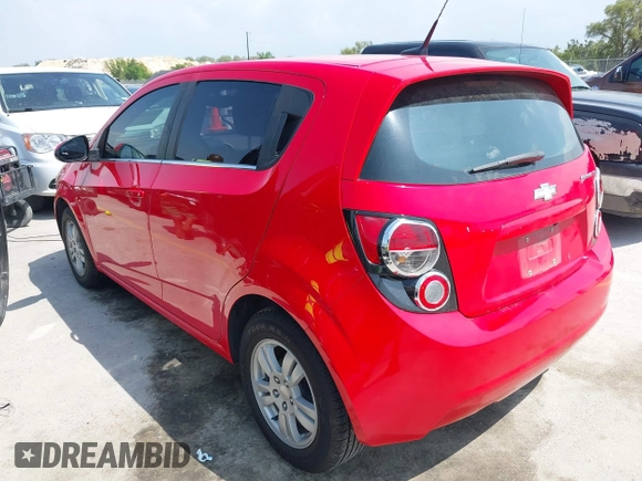 2014 Chevrolet Sonic LT with VIN 1G1JC6SH7E4135650, listed as a IAAI auction lot 41954694 with 103,944 mi miles. Bid and sale history available at carsss.com. Image 3.